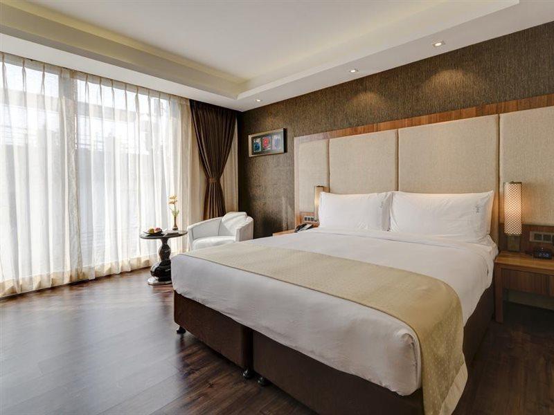 Holiday Inn Kolkata Airport, an IHG Hotel Bagian luar foto Deluxe Room